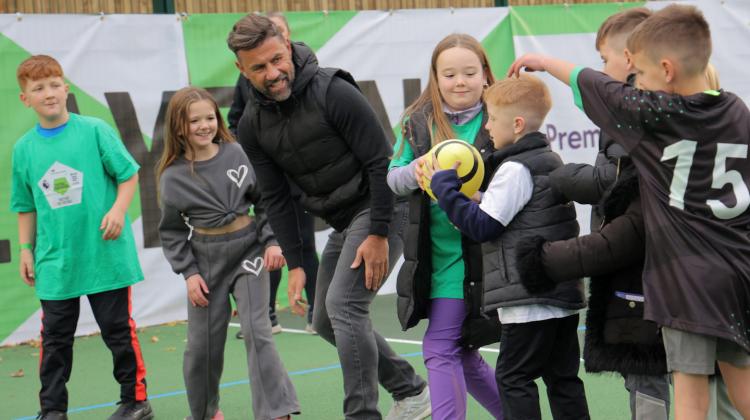 Anton Ferdinand and Fara Williams stand together at Burgess Park